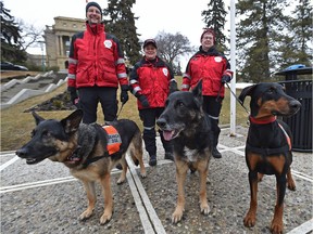 Search and Rescue Dog Association of Alberta (SARDAA) members Michael Arychuk with Jaida, 6, Maryann Warren with Gotta, 10 and Michelle Limoges (right).