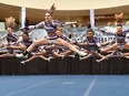 From left, Aedan Jackson, 17, and Qierra Rodriguez, 18, from the Alberta Cheer Empire team at the Alberta Cheerleading Association Championships at West Edmonton Mall Sunday.