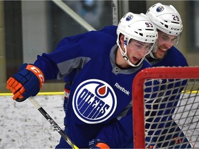 Ryan Nugent-Hopkins (93) and Leon Draisaitl during practice held at the Leduc Recreation Centre before departing for a out-of-town game. Edmonton, March 9, 2016.