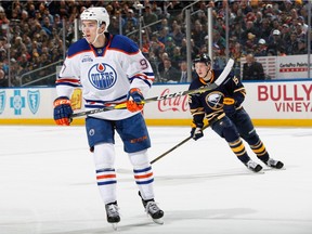 Connor McDavid #97 of the Edmonton Oilers skates against Jack Eichel #15 of the Buffalo Sabres at First Niagara Center on March 1, 2016 in Buffalo, New York.