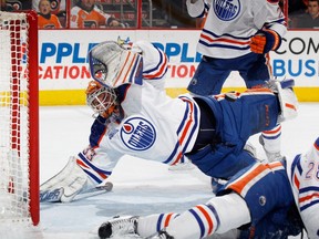 Cam Talbot #33 of the Edmonton Oilers makes the second period save on Sean Couturier #14 of the Philadelphia Flyers (not shown) at the Wells Fargo Center on March 3, 2016 in Philadelphia, Pennsylvania.