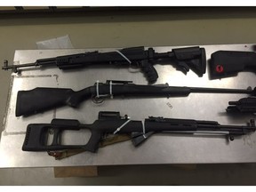 Firearms seized during a search warrant execution that uncovered a marijuana grow operation in a home near 96 Street and 111 Avenue on Tuesday, March 2, 2016.