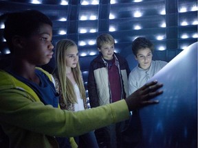 (Left to right.) Astro (Brian Bradley), Ella Linnea Wahlstedt, Reese Hartwig, and Teo Halm star in Relativity Media's Earth to Echo, playing at Cineplex Odeon North on Saturday, March 12.