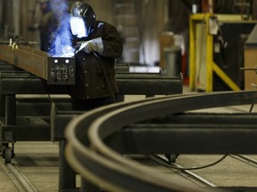 A welder at Collins Steel in Edmonton where the Wildrose Party called Tuesday on the Alberta government to provide financial relief to businesses.