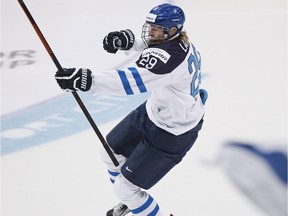 Patrik Laine of Finland celebrates scoring against Russia during the 2016 IIHF World Junior Ice Hockey Championship final match between Finland and Russia in Helsinki, Finland, Tuesday Jan. 5, 2016. (Roni Rekomaa/Lehtikuva via AP) FINLAND OUT