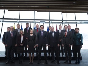 Prime Minister Justin Trudeau, centre, poses with Canada's premiers following the First Ministers Meeting in Vancouver on March. 3, 2016.