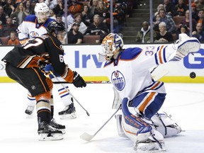 Anaheim Ducks' Rickard Rakell scores on Oilers goalie Cam Talbot during NHL action in February 2016. The two teams meet again Monday, March 28, 2016, at Rexall Place in Edmonton.