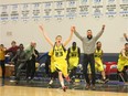 NAIT Ooks guard Wyatt Beaver, left, runs onto the court in celebration after the Ooks won the CCAA Men's Basketball National Championship at the Syncrude Sport and Wellness Centre in Fort McMurray Alta. on Saturday March 19, 2016. The Ooks beat the Humber Hawks 79-74 to win their first national title in men's basketball since 2003.