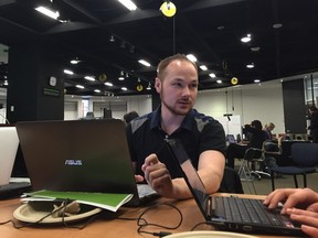 Rhys Chouinard sees value in mining social media data to gauge the public's reaction on various topics. He spent Saturday, March 5, 2016, working on his project at the city's Open Data Day Hackathon.