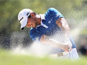 Jason Day of Australia hits a fairway bunker shot on the sixth hole during his match against Louis Oosthuizen of South Africa in the championship match of the World Golf Championships-Dell Match Play at the Austin Country Club on March 27, 2016 in Austin, Texas.