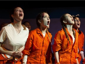 The chorus performs during WP Wagner High School's production of The Trojan Women.
