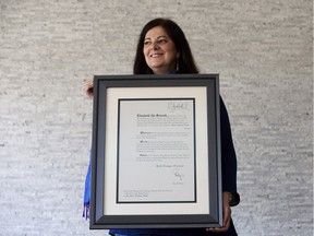 Mona Nashman-Smith and the letter she received from the Queen, telling her she is a member of the Most Excellent Order of the British Empire.