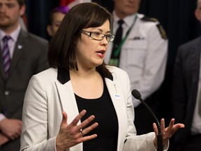 Minister of Justice and Solicitor General Kathleen Ganley, in a November 2015 file photo, could easily have answered questions about whether Alberta's ethics commissioner had all the relevant information when reviewing Alison Redford's handling of a tobacco litigation contract, says University of Alberta associate law professor Cameron Hutchison. He says it was unnecessary to commission a $160,000 report.
