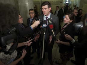 Edmonton Mayor Don Iveson speaks to the media after the NDP delivered their provincial budget at the Alberta Legislature, in Edmonton on Wednesday.
