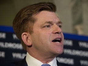 Wildrose Leader Brian Jean speaks to the media after the NDP delivered the 2016-17 provincial budget at the Alberta legislature, in Edmonton Alta. on Thursday, April 14, 2016.