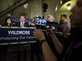 The Wildrose is on the right track with its calls to reduce provincial government, writes Laurie Hawn. This file photo shows Wildrose leader Brian Jean speaking to the media after the NDP delivered the 2016-17 provincial budget at the Alberta Legislature on April 14, 2016.
