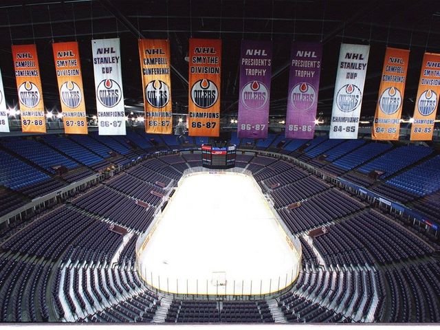 Cutlines Pics are of the banners as requested. As discussed need photos of coliseum shooting down and across. Paying particular attention to the banners. Might want talk to swanson and Greg before you go. / 970410.GAV COLISEUM Edmonton Oilers banner