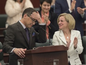 Finance Minister Joe Ceci delivers the budget in the Alberta legislature on April 14, 2016.