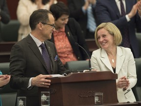 Finance Minister Joe Ceci, standing with Premier Rachel Notley, delivered the 2016 budget at the Alberta Legislature on April 14, 2016. Alberta Federation of Labour president Gil McGowan writes the NDP wisely opted to stimulate the economy and help families facing an economic storm, as opposed to ushering in major cuts with the budget.