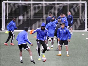 Players run through drills during FC Edmonton practice at Clareview Rec Centre on Saturday, ahead of Sunday's game against the Ottawa Fury. (Dan Diedlhuber)