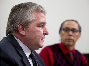 Del Graff, Alberta's child and youth advocate, released his office's investigative review on the suicide deaths of seven young aboriginal Albertans on April 25, 2016 . Elder Francis Whiskeyjack, a member of the investigative review committee, listens to him speak.