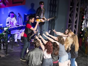 St. Joseph High School students perform in Rock of Ages.