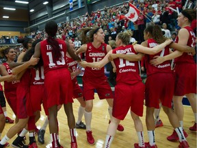 EDMONTON, ALTA: ¬†AUGUST 16, 2015 --  Canada celebrates a win over Cuba 82-66 for the gold at the FIBA Americas Women's Basketball tournament in Edmonton. August 16, 2015. (Photo by Bruce Edwards / Edmonton Journal)