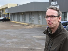 Ian Hicks heads up an advocacy group that wants to see the Petrolia Mall revitalized and is frustrated that a lease held by Loblaws doesn't allow a potential restaurateur to develop the old mechanic building in Edmonton, April 13, 2016.