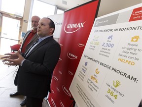 Enmax executive VP Dave Rehn (left) and Bissell Centre CEO Gary St. Amand speak about the corporation's $100,000 donation to the centre's Cimmunity Bridge Program at the Bissell Centre in Edmonton, Alta., on Friday April 29, 2016.