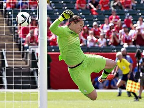 Canada's goalkeeper Erin McLeod (1) makes a save against China during a FIFA Women's World Cup soccer match in Edmonton.