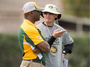 Eskimos' General Manager Ed Hervey, left, and Head Coach Jason Mass socialize during the mini-camp at Historic Dodgertown in Vero Beach on Sunday, April 17, 2016.