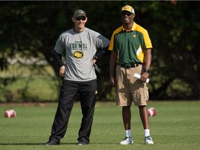 Eskimos' Head Coach Jason Maas, left, and General Manager Ed Hervey socialize during the mini-camp at Historic Dodgertown in Vero Beach on Sunday, April 17, 2016.