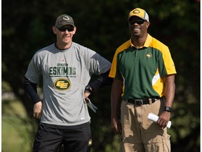 Eskimos' Head Coach Jason Maas, left, and General Manager Ed Hervey socialize during the mini-camp at Historic Dodgertown in Vero Beach on Sunday, April 17, 2016.