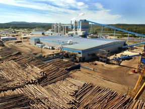 The log yard, sawmill, and pulp mill at the Millar Western Forest Products operation at Whitecourt.