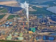 An aerial view Suncor's base plant oilsands upgrading facility next to its oilsands mining operations north of Fort McMurray.