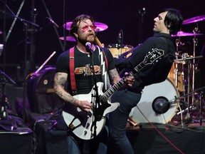 Jesse Hughes, the singer of Eagles of Death Metal, performs at the Olympia concert hall in Paris, on Feb. 16, 2016. The band plays Edmonton on Thursday, April 28.