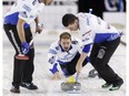 Reid Carruthers (centre) throws during the Grand Slam of Curling 2016 Humpty's Champions Cup play versus the John Shuster rink at Sherwood Park Arena Sports Centre in Sherwood Park, Alta., on Thursday April 28, 2016. Competition runs through May 1. Photo by Ian Kucerak