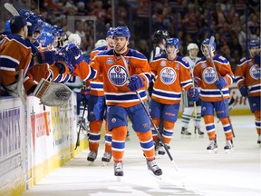 The Edmonton Oilers' Taylor Hall (4) celebrates his goal against  the Vancouver Canucks during third period NHL action during the last NHL game at Rexall Place, in Edmonton Alta. on Wednesday April 6, 2016. The Oilers won 6-2. Photo by David Bloom