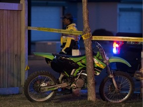 Police continue to work at the scene of a fatal motorcycle accident near 32 Street and Silverberry Road, in Edmonton Alta. on Thursday April 14, 2016.