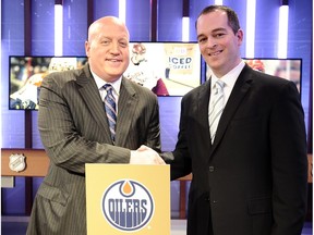 TORONTO, ON - APRIL 18: NHL Deputy Commisioner Bill Daly congratulates Edmonton Oilers Assistant General Manager Bill Scott on the 1st overall pick at the National Hockey League Draft Lottery on April 18, 2015 at the Sportsnet Studios in Toronto, Ontario, Canada.