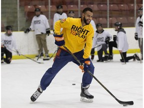 The Edmonton Oilers' Darnell Nurse takes part in a Right To Play hockey clinic with youth from the Alexander First Nation, at Servus Centre in St. Albert Alta. on Monday April 4, 2016. Photo by David Bloom