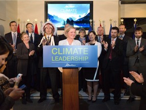 Premier Rachel Notley unveils Alberta's climate strategy in Edmonton in November 2015. Kaitlin Szacki and Jennifer Winter write that the 2016-17 Alberta budget should include tax cuts to offset the carbon tax that is part of that climate strategy.