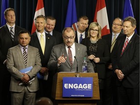 Ric McIver (middle/at podium), Interim Party Leader, and the Alberta Progressive Conservative Party Caucus, launched a new public engagement initiative at the Alberta Legislature on Monday.