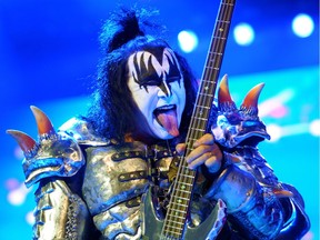 Bassist Gene Simmons as Kiss performs at Rexall Place in Edmonton, July 12, 2013.