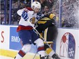 Edmonton's Brett Pollock (39) collides with Brandon's Kale Clague (10) during the first period of a WHL playoff game between the Edmonton Oil Kings and the Brandon Wheat Kings at Rexall Place in Edmonton, Alta., on Sunday April 3, 2016.