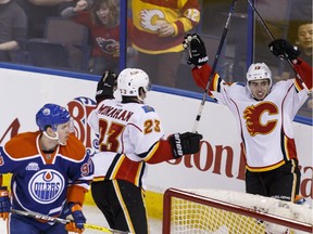 Calgary's Mikael Backlund celebrates a goal with his teammates during the Flames' 5-0 win over the Edmonton Oilers at Rexall Place on Saturday. April 2, 2016.
