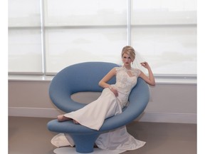 Delaney Auger models a custom wedding gown by Kelly Madden.