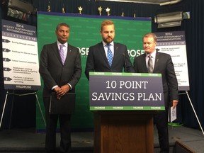 Wildrose MLAs, from left, Prasad Panda, Derek Fildebrandt and Grant Hunter unveil the party's plan to save up to $2 billion from the provincial budget on Tuesday, April 12, 2016.