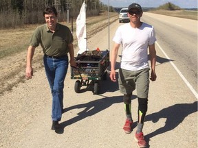 Jason Dubrule (right) and Todd Loewen, Grande Prairie-Smoky Wildrose MLA walk toward Edmonton.