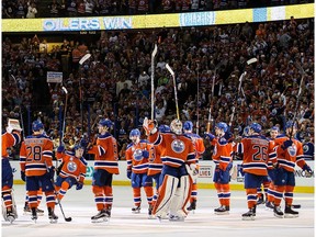 The Edmonton Oilers salute the fans after defeating the Vancouver Canucks on April 6, 2016 at Rexall Place in Edmonton, Alberta, Canada. The game is the final game the Oilers will play at Rexall Place before moving to Rogers Place next season.